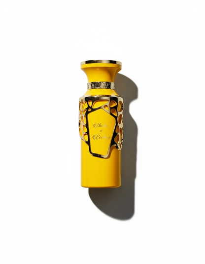 Flat-lay Ode to Elixir perfume with dramatic shadow