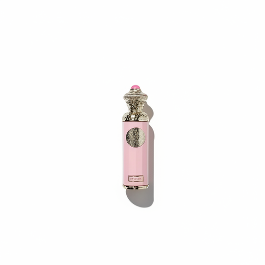 Pink perfume bottle on clean background