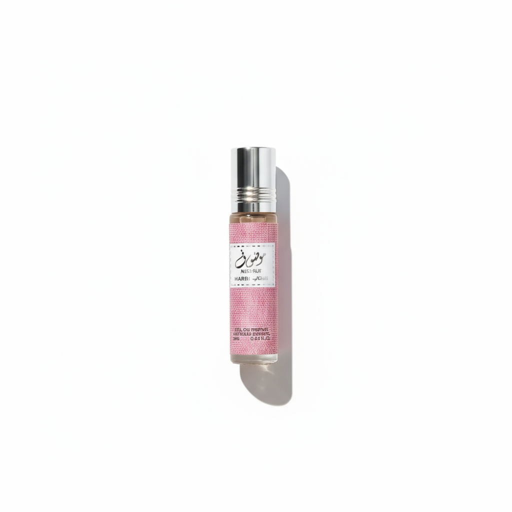 Pink perfume roller bottle on clean background